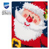Cross-stitch kit with a Santa Claus design on a blue and red background, featuring Vervaco branding.