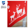 Embroidered reindeer design on red fabric with Vervaco logo.