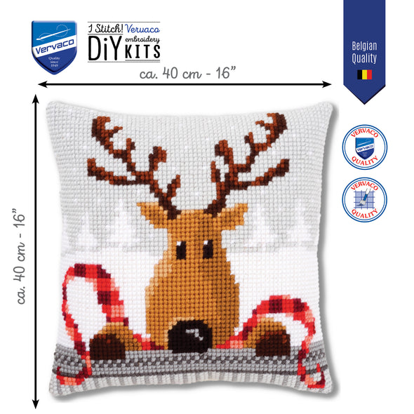 Cross-stitched reindeer design on a pillow with Vervaco branding and dimensions.