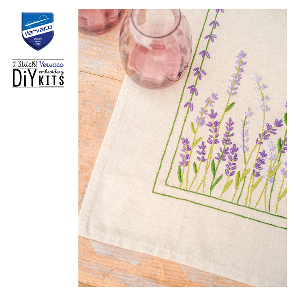 Embroidered lavender design on a towel with Vervaco logo.